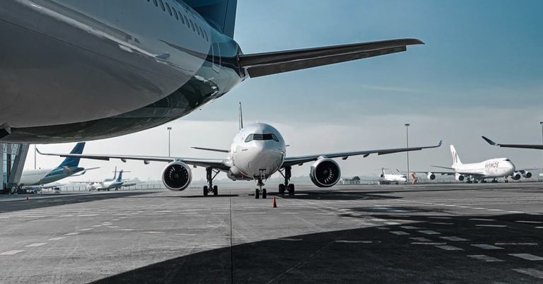 Travel and tourism coalition addresses government, planes on tarmac to signify international travel